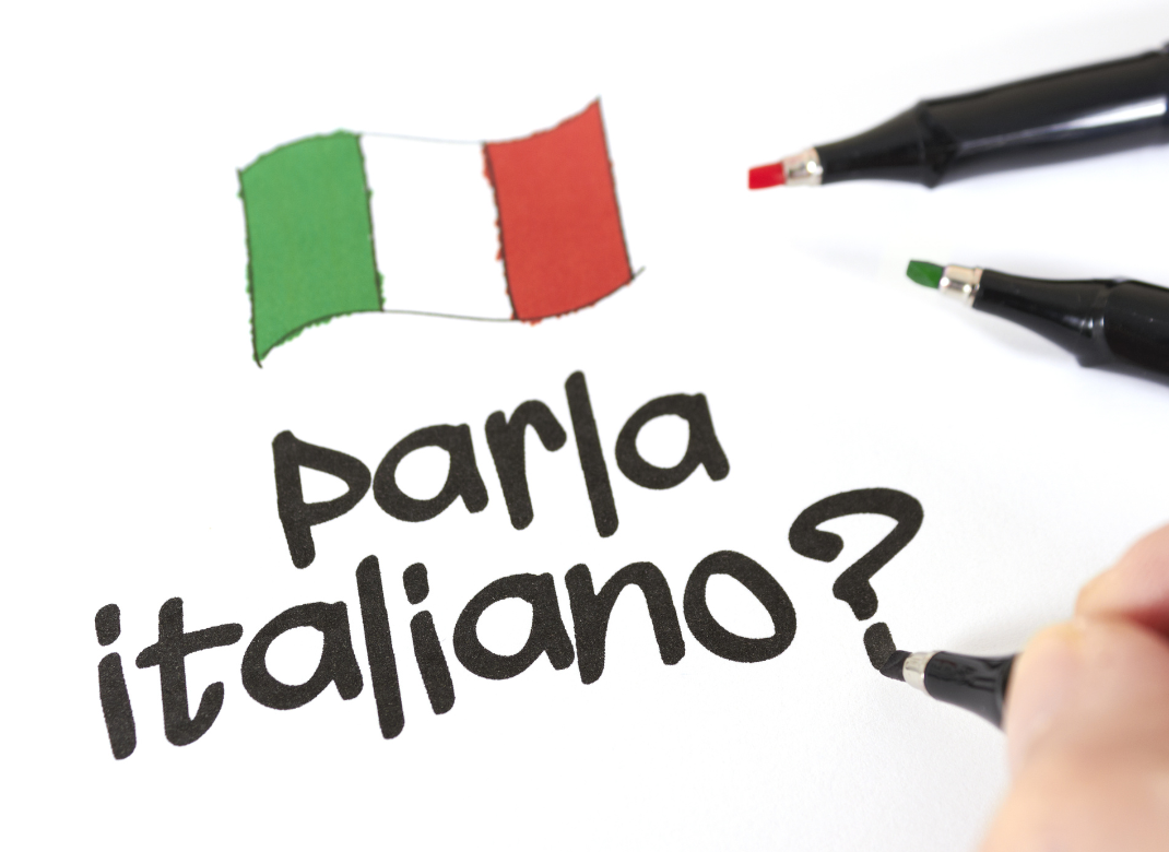 italian flag with text parla italiano? and pens
