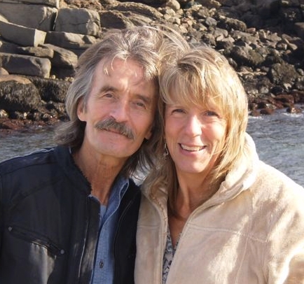 photo of curt bessette and jenn kurtz by the water