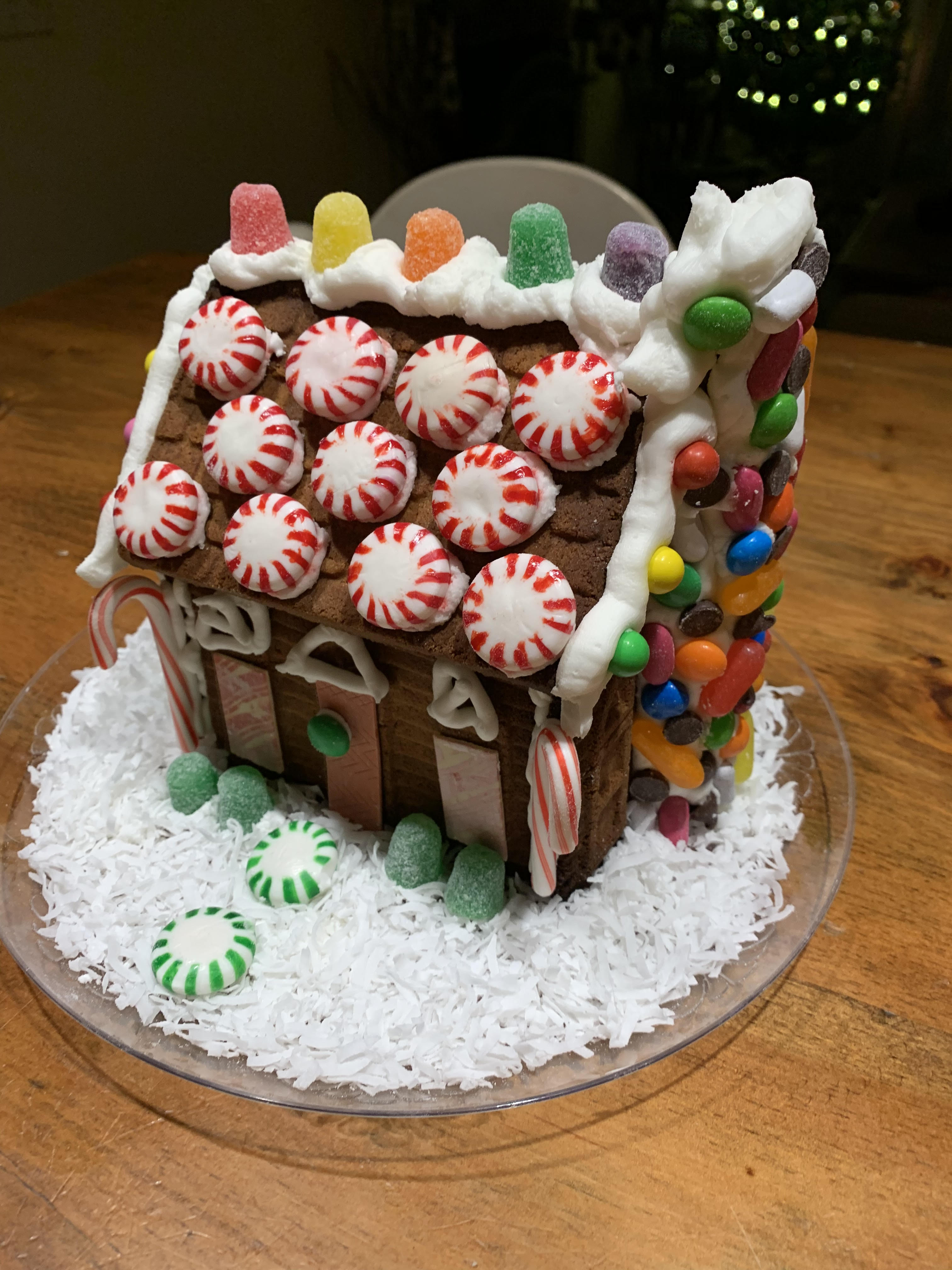 gingerbread house with peppermint round roof