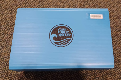 box with York Public Library logo