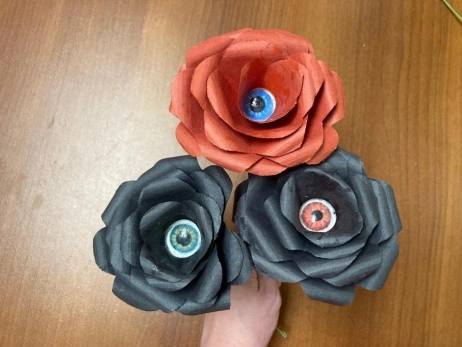 paper flower with an eyeball decoration