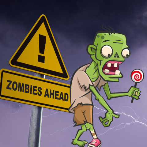 cartoon zombie holding a lollipop next to a caution sign that reads Zombies ahead!