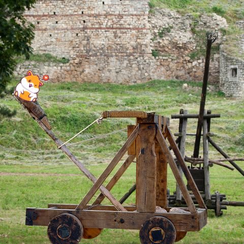 catapult with a little cartoon hamster in the bucket