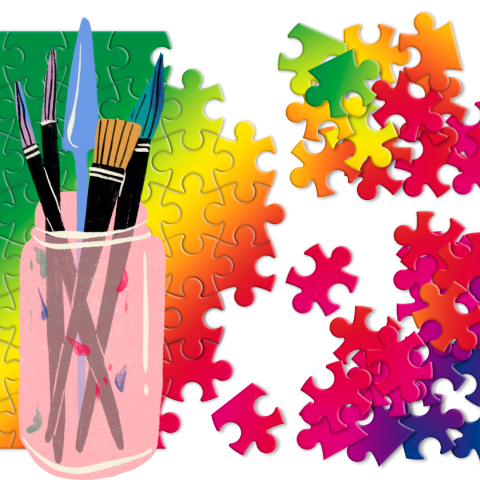 puzzle pieces with glass jar of art supplies