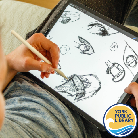 middle school child drawing on a tablet