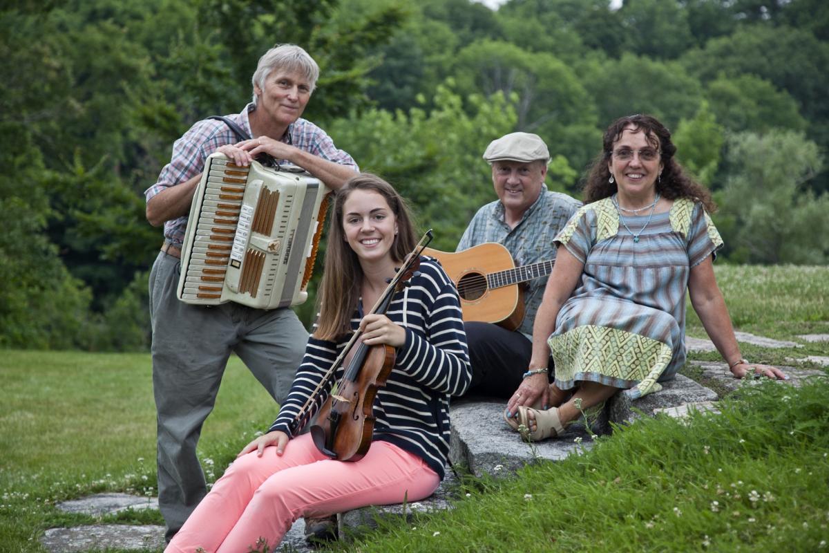 la madeleine quartet sitting on grassy field